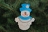Blue Scarf Snowman Ornament
